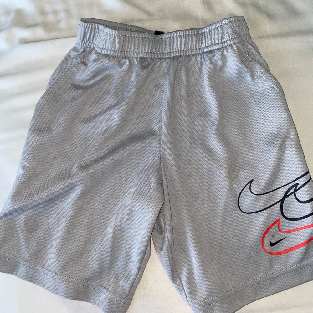Light Gray Nike shorts with Elastic Waistband and Graphic Design Size 6/7